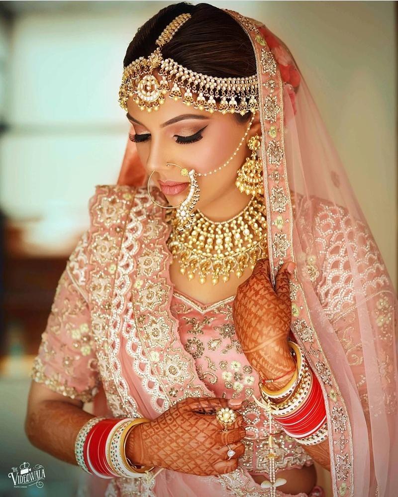 latest artificial jewellery for bridal lookwith complete bridal set including necklace earrings and maang tikka
