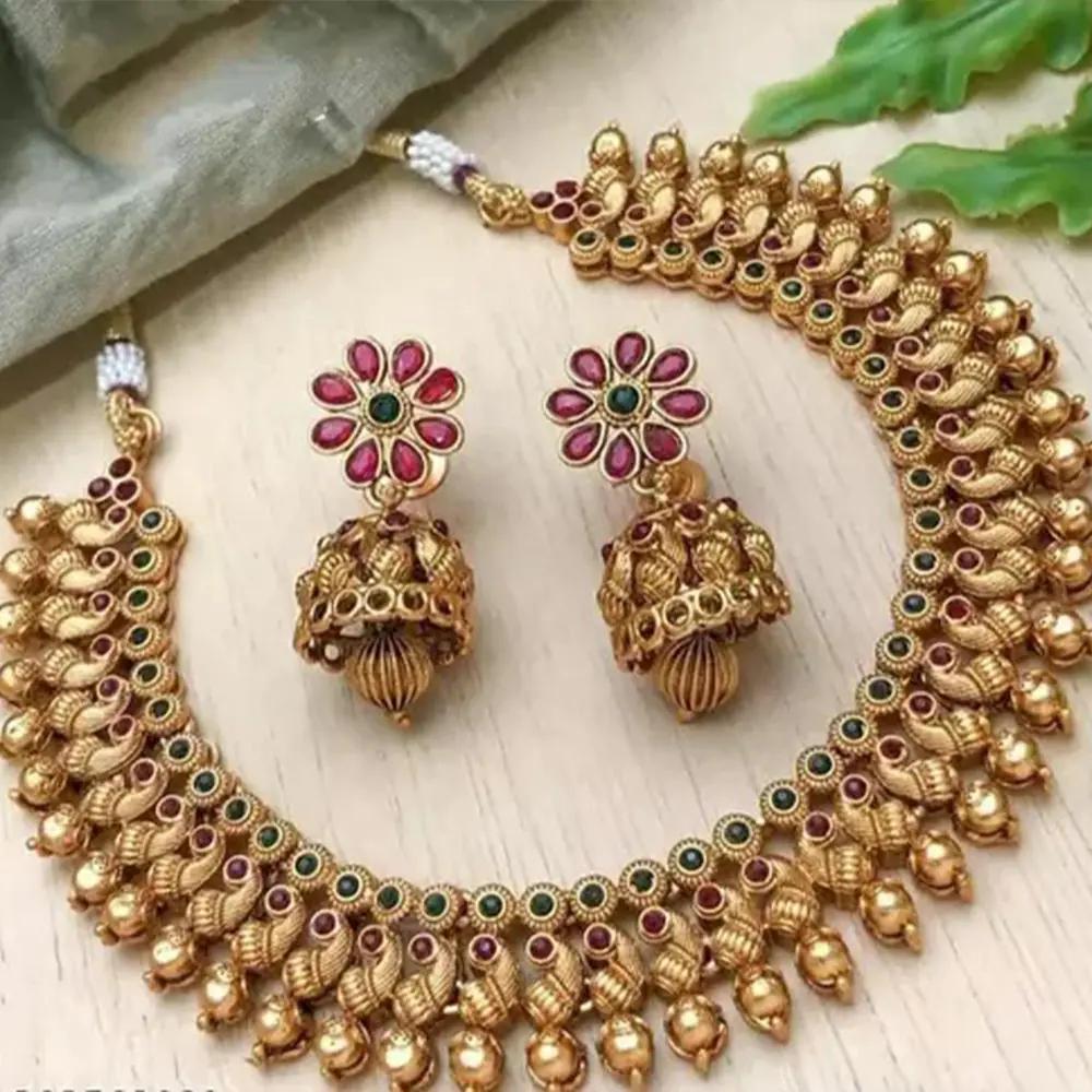 latest artificial jewellery for bridal look with statement jhumka and chandbali earrings