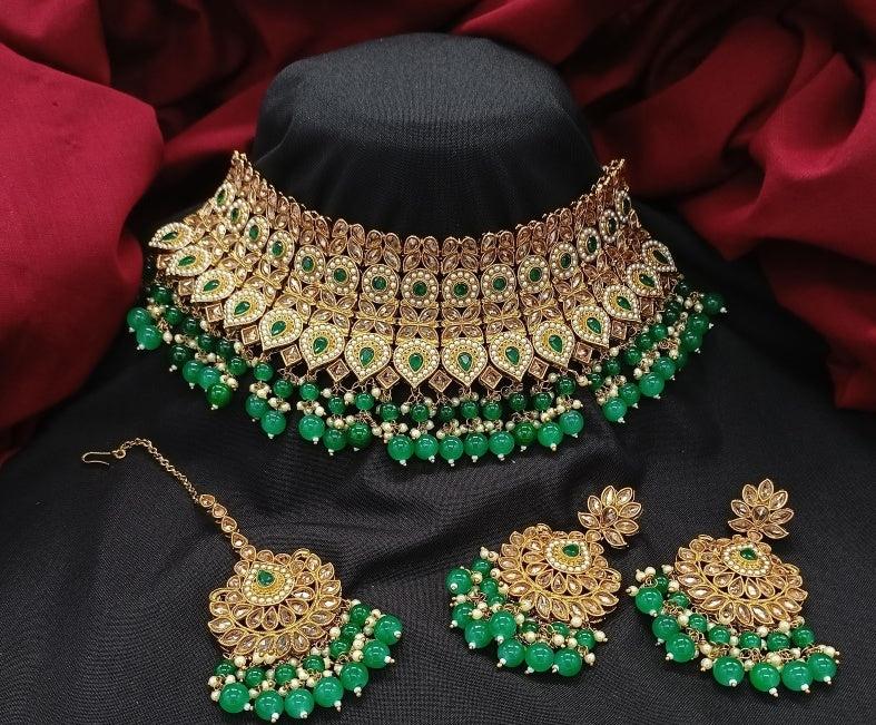 latest artificial jewellery for bridal look with statement jhumka and chandbali earrings